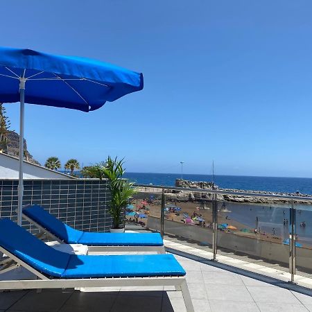Billy'S Beachfront Apartment With Pool Access ปวยร์โต เด มอแกน ภายนอก รูปภาพ