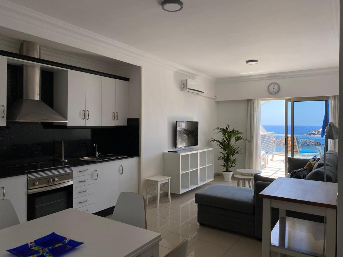 Billy'S Beachfront Apartment With Pool Access ปวยร์โต เด มอแกน ภายนอก รูปภาพ